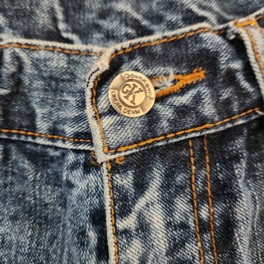 Vintage Calvin Klein Jeans Ripped Blue Jean Shorts, Size 28
